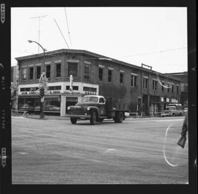 View of a corner drugstore (has Gem in the name).