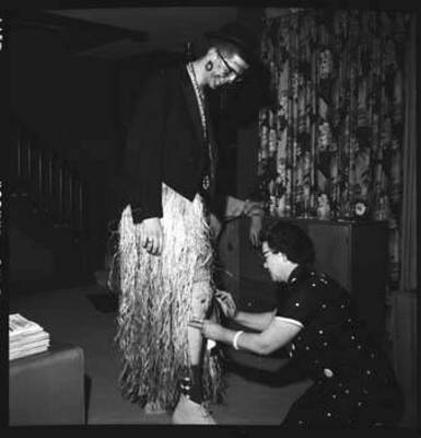 Image of man wearing costume at party.