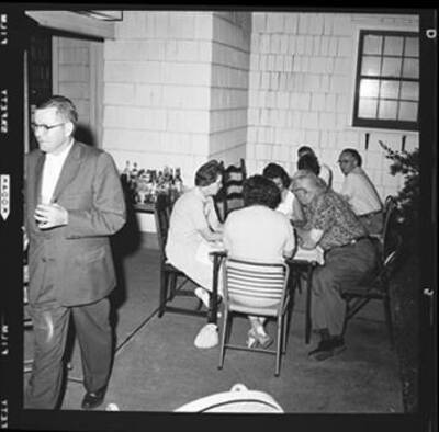 Unidentified people at a Poker Club party (Views of Helen and Henry Zimet, Marguerite Laughlin, Madeline Espe, Harold and Helene Lough, Mickey Andrews, and Kyle Laughlin)