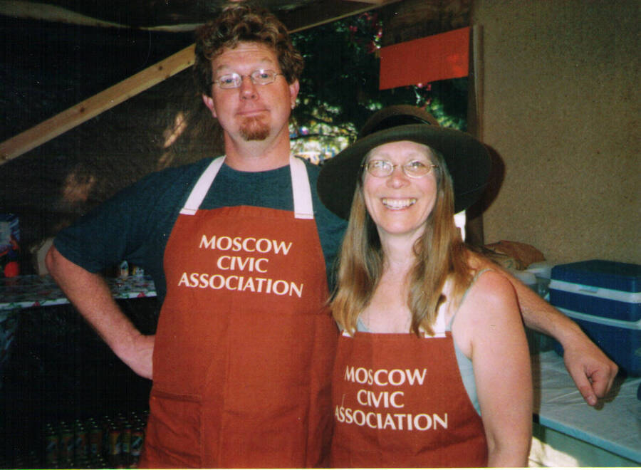 Moscow Civic Association booth at 2004 Ren Fair. Subjects read as names appear, left to right: Peterson, Ivan; Palmer, Pam.
