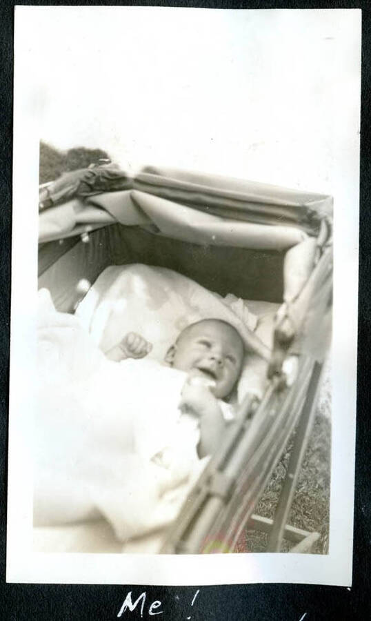 Baby photo of Bill Hopkins from his family scrapbook