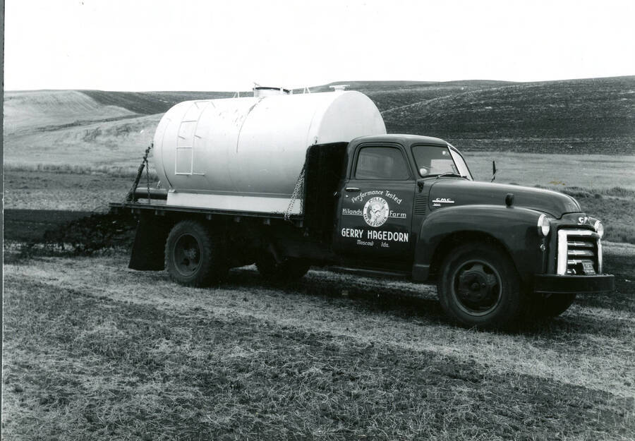 Sludge Truck spreading liquid sludge on U of I farm fields (pre 1980)