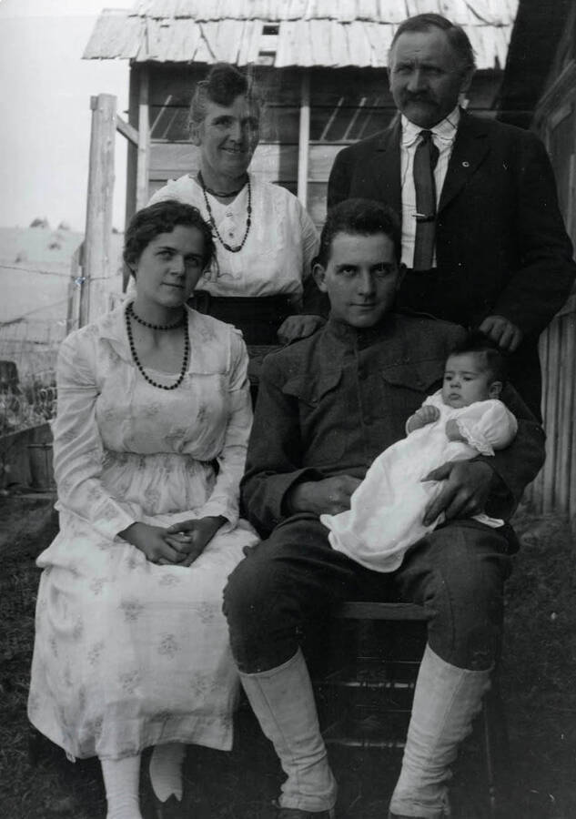 Standing are Bertha Allen Nirk and John Matthew Nirk. Seated are Mary Bysegger Nirk and Durell Nirk holding daughter Cleora Anna.