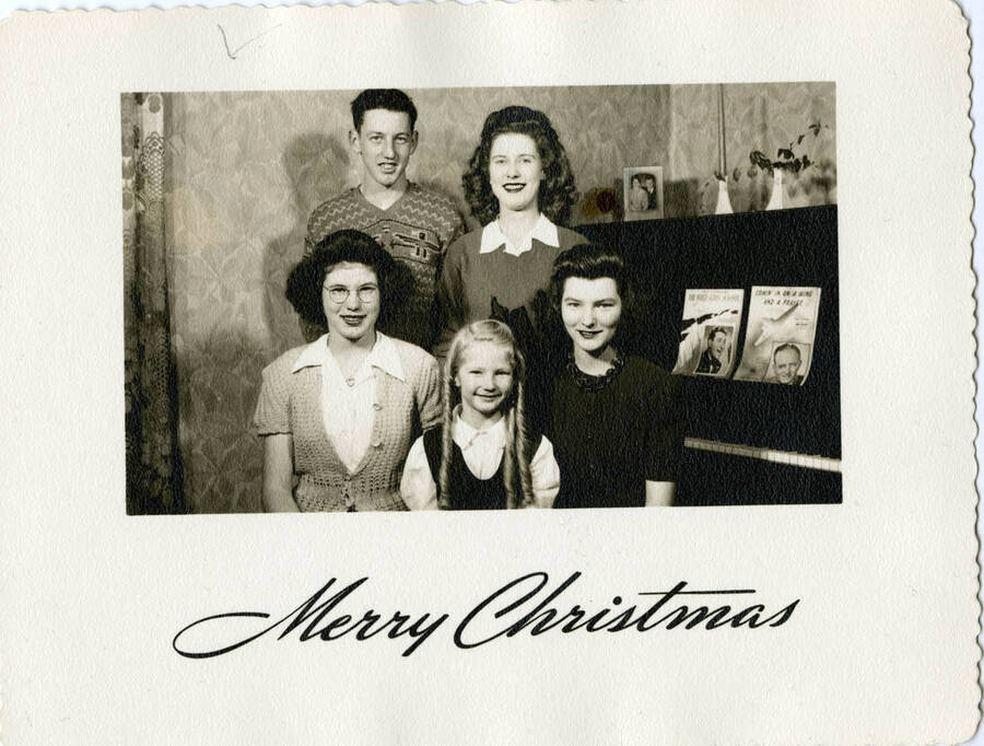 The Packard Family Christmas card. Individuals identified left to right, back to front: Cecil, Doris, Donna, Wilma, Mildred.