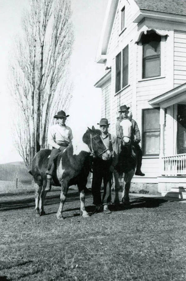 Roy and Max Davis and Sonny McMasters on horseback at the Bean home on Yellow Dog Road