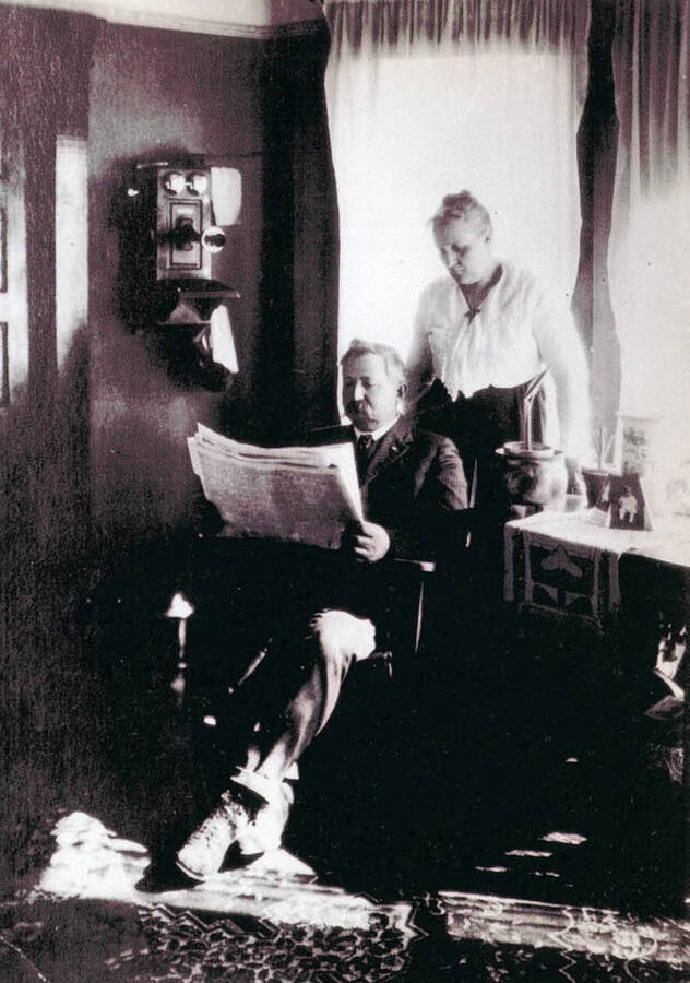 J. Fred and Lula (Beeson) Rohn. Taken in house on Parvin Road near Colfax, WA. Interior of home featured.