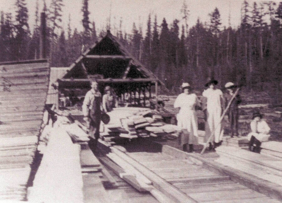 Alva Strong Mill at Middle Deep Creek, Ezra Graff, James Strong, Agnes Strong, Mrs. Rumbel, Edna Strong on Tramway, about 1921;