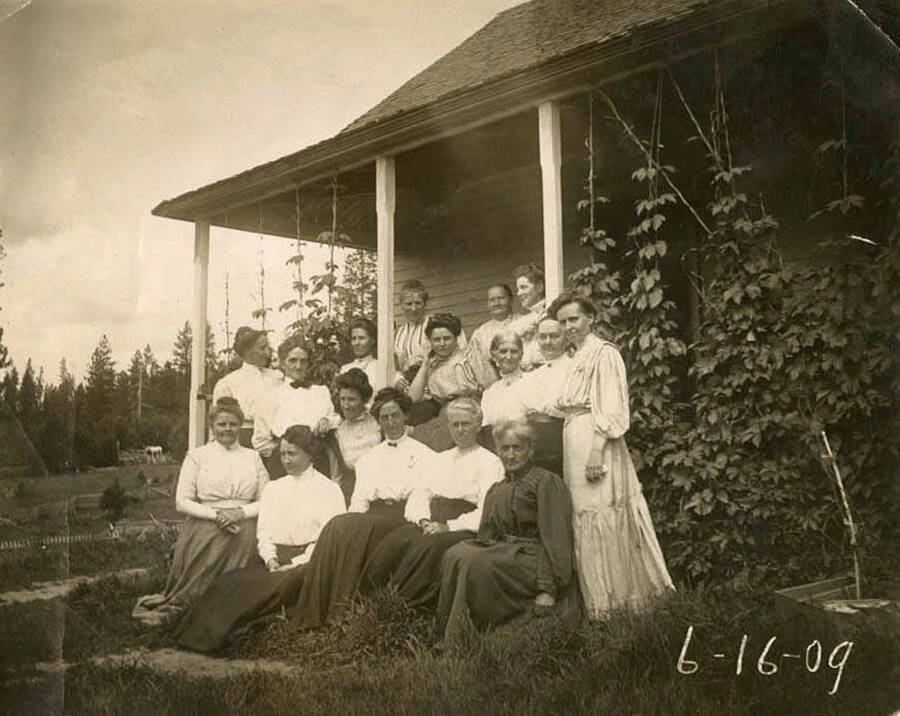 The women of the Clark family gathered for a group portrait during Vern Clark's twenty-first birthday celebration.