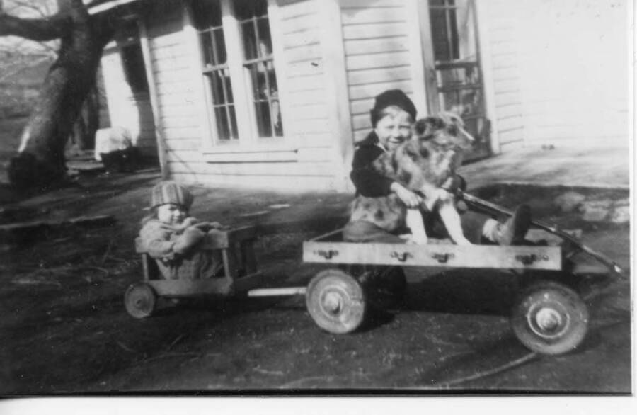 Loree and Loyal Fleener as children with unknown Fleener family dog.