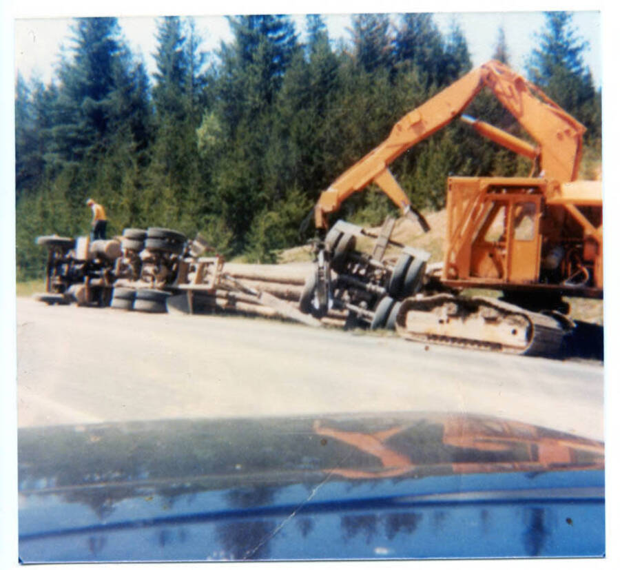 Tim Fleener tipped his logging truck over outside of Deary, Idaho. Fleener family Droutt loader helping to right truck.