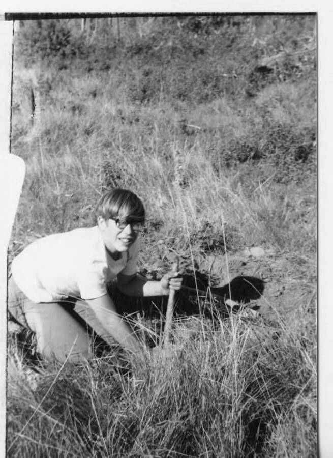Timothy Paul Fleener digging holes.