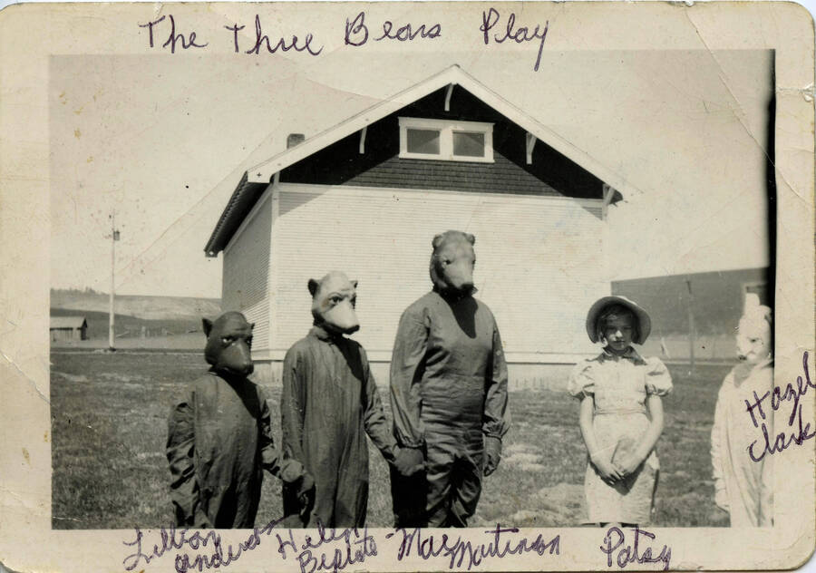 Schoolchildren of Burden school, dressed in costume for ""The Three Bears"" Christmas play, in front of the Burden schoolhouse. Names on photo.