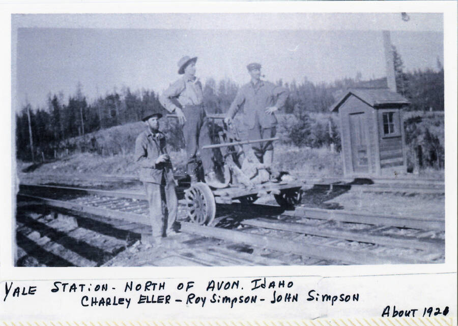 View of men on handcar at the Yale Station north of Avon, ID. Includes Charley Eller, Roy Simpson, John Simpson