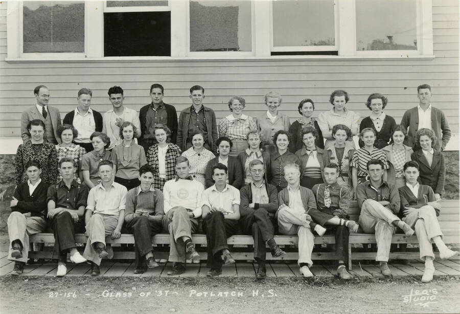 Photo of the Potlatch High class of 1937, in front of the high school