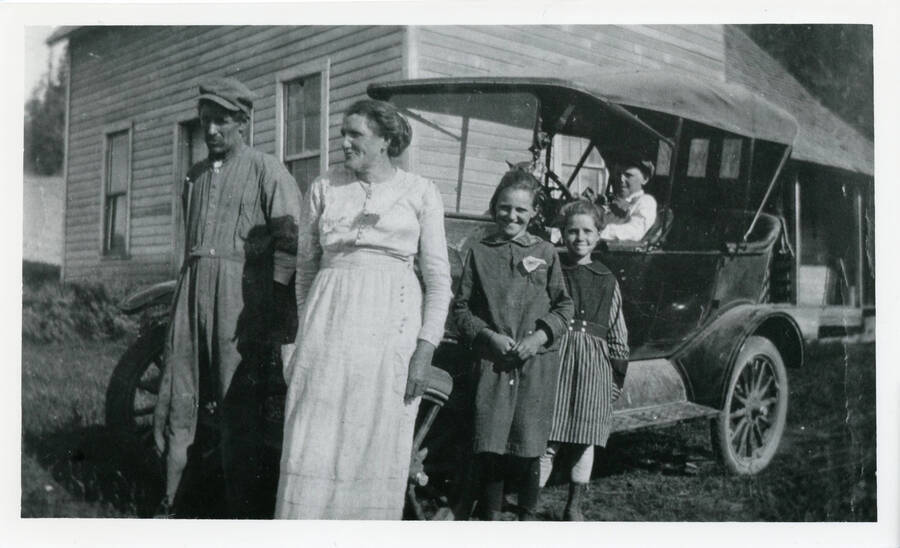 Family photo (left to right): Mr. Claude and Mrs. Claude (C.V.) Hall, Louella, Zythel, and son Pearl. They were neighbors of John and Bertha Nirk.