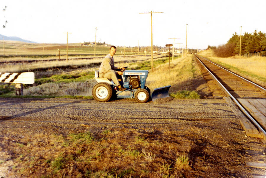 Operator Lyle Brouse grading drive way (pre-1985)
