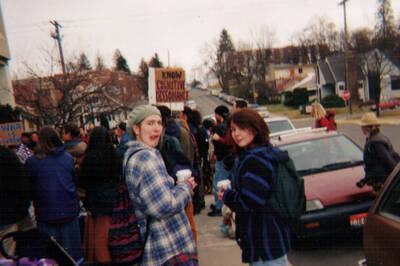 Anti-War Rally, Moscow ID. Started at UI Library then progressed to the Court House where they washed the flag. When the bucket was emptied the water had turned red and you could hear the clatter of bullets.