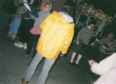 Bookpeople moves across the street. Customers came to form a book brigade and handed the stock across the street. The Border Highlanders played, Laura's Tea Room & MIkey's Gyros were open with hot drinks & soup. Locals plays music.