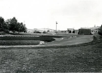 Pre 1948 Trickling Filter #2 towards the East showing Boiler room and Secondary Digester