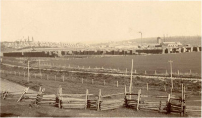 Postcard to Rose Katzenberger from Charles Bysegger, depicting a long shot of the Potlatch Mill.
