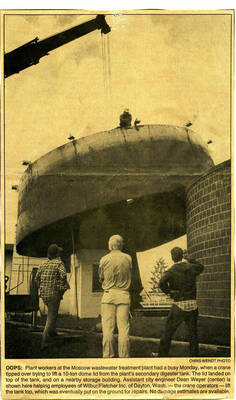 Newspaper clipping, photo with caption: "Plant workers at the Moscow wastewater treatment plant had a busy Monday"