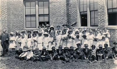 Sunday School class pictured outside of old Union Church that burnt down. Goldie Clyde in the photo.