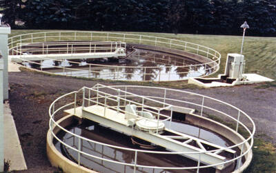 (front) Gravity Thickener (back) Primary Clarifier (to the right) Barminutor Bar Screen - Influent Flow