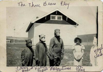 Schoolchildren of Burden school, dressed in costume for "The Three Bears" Christmas play, in front of the Burden schoolhouse. Names on photo.