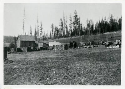 Photo of the Elmore place before 1900. The old house still stands behind the house that Charley Bysegger built.