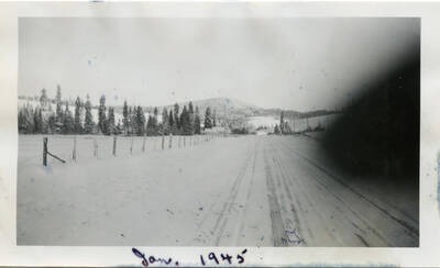 Highway 95 in front of our house with Mineral Mountain in the background and Elmore Church on the left.