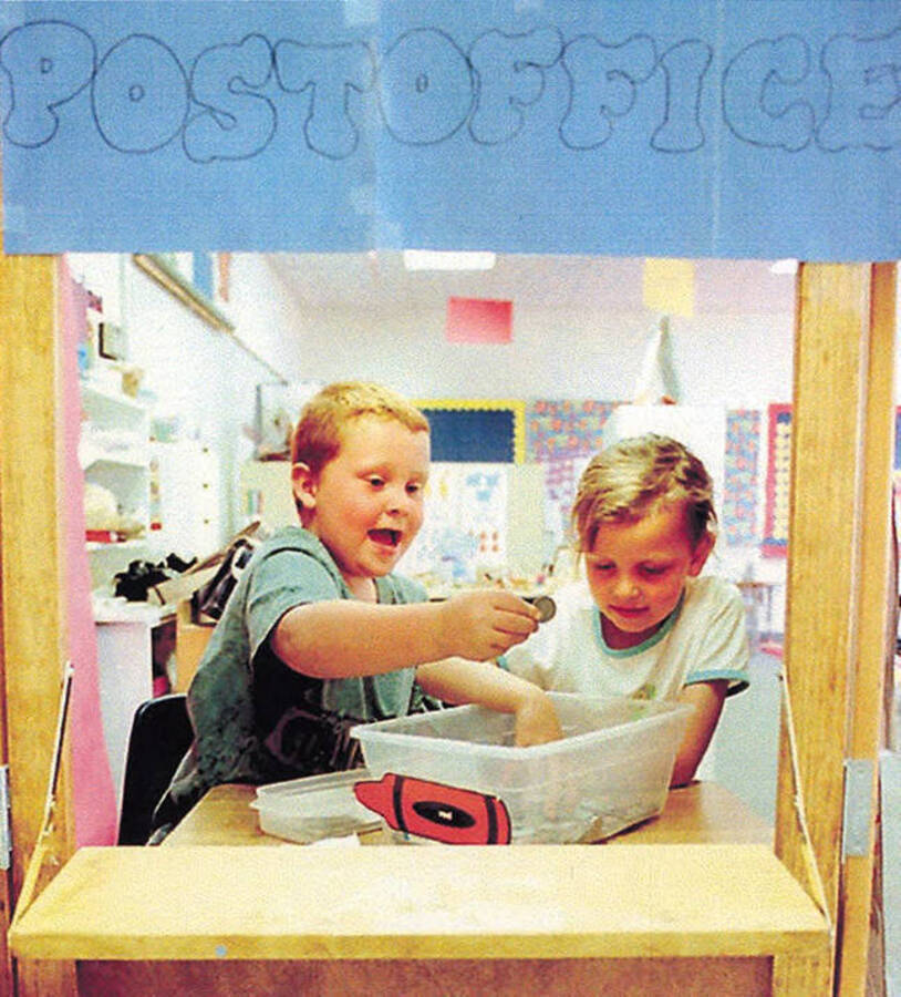 Children playing in a classroom during Kidstown at Bovill's third grade.