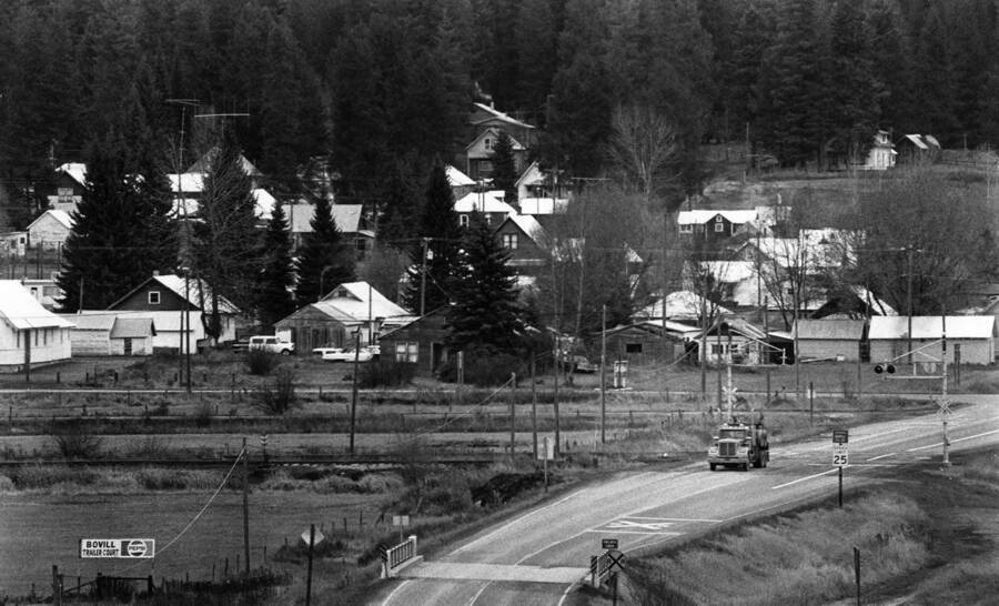A truck drives on the street in Bovill's residential area.