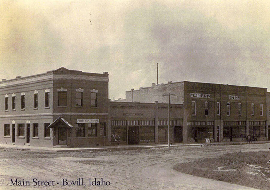 A view of Bovill's Main Street lined with stores.