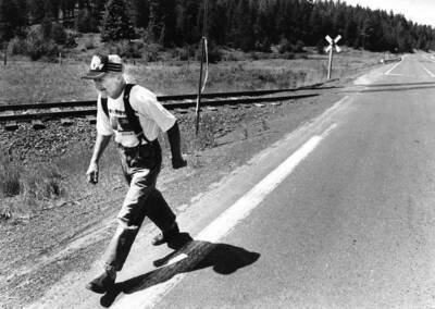 Billy Sanderson, a Bovill resident, participating in Centennial Proclamation Relay during Bovill's Statehood Day celebration.