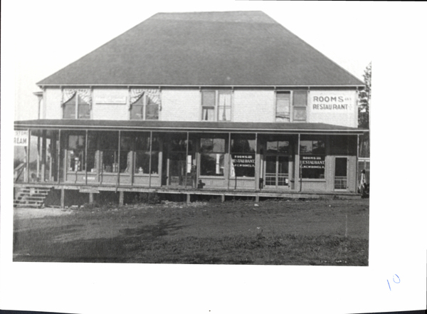 Canta Bldg. With the Forest Service on the top floor. Image contains the text: "ROOMS   RESTAURANT   ROOMS AND RESTAURANT   ROOMS AND RESTAURANT   J. A. McDOWELL   10"