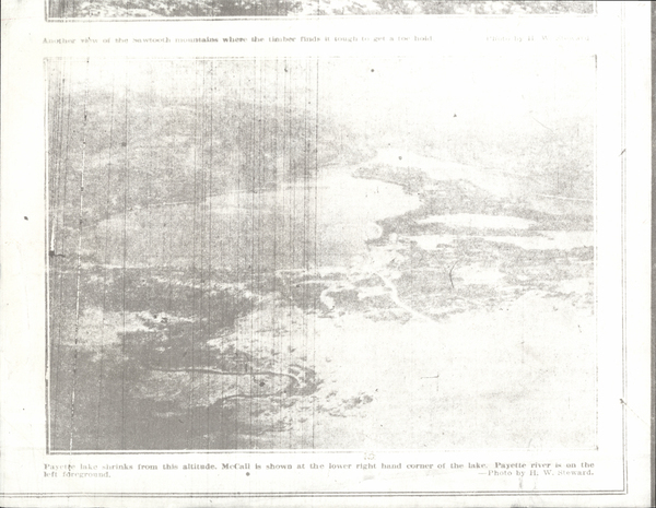 Payette lake as it shrinks from the high alttitide. McCall is shown at the lower right hand corner of the lake. Payette river is on the left forground.. Image contains the text: "Another view of the sawtooth mountains where the timber finds it tough to get a toe hold. Photo by H. W. Steward  Payette lake shrinks from this altitude. McCall is shown at the lower right hand corner of the lake. Payette river is on the left foreground. — Photo by H. W. Steward."