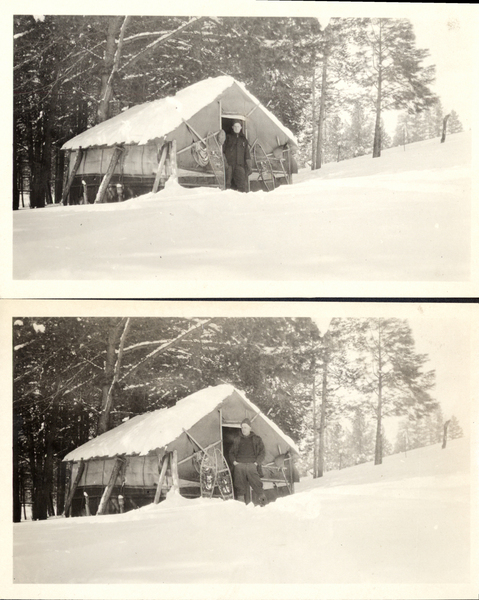 Man posing in front of a tent-frame cabin with snowshoes