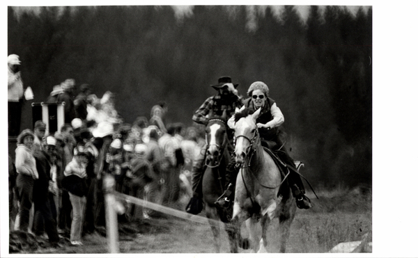 Thunder Mountain Days, horse race, a women rider in the lead, and a man behind