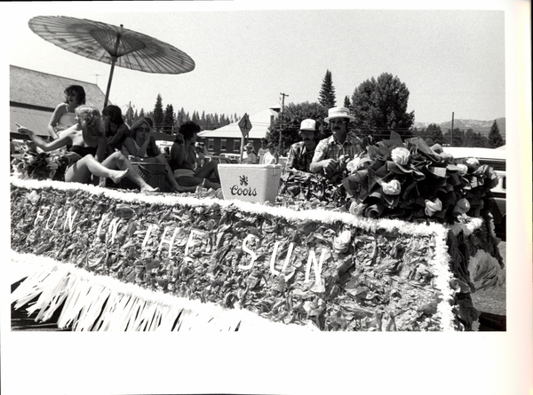 “Fun in the Sun” float. Image contains the text: "FUN IN THE SUN Coors"