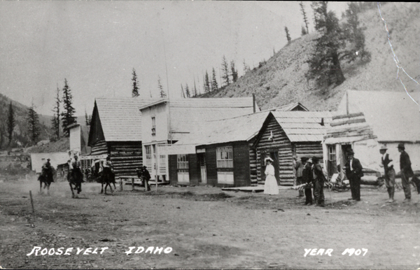 Original postcard of Roosevelt Idaho in view old buildings and people. Image contains the text: "ROOSEVELT IDAHO YEAR 1907"