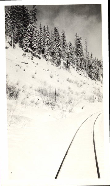 Snow scene with train tracks