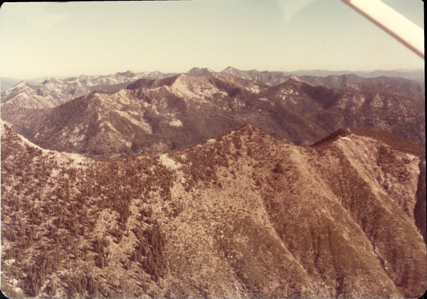 Original colored aerial photograph of mountains east of McCall