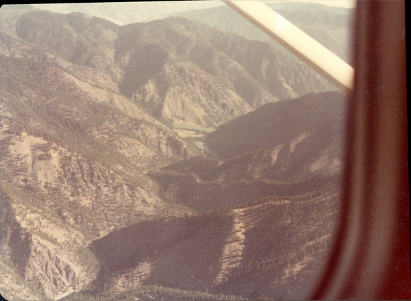 Original colored aerial photograph of mountains