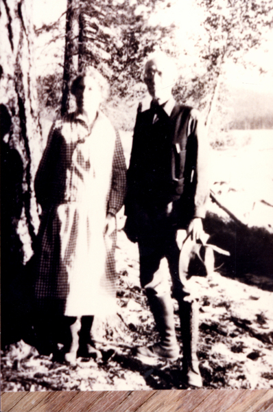 Photograph of Charles Luck and Mrs. Luck in McCall. On Reverse side is written, “Charles Luck surveyed the Warren Wagon Road when it was built from McCall to Upper Payette Lake in 1905. Charles Luck, congregational Minister from Weiser, married Fred and Jeanette Burgdon on July 28, 1902, William Allen White played the piano. Charles Luck also performed the burial service for Fred Burgdorf when he died in Weiser in Jan. 1929.