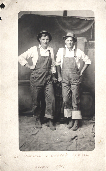 Original postcard of Cy Kimball and George McCall posing. Image contains the text: "CY KIMBALL & GEORGE MCCALL APRIL, 1918"