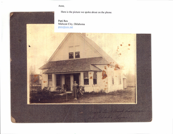 Photograph of “Uncle Tom and Aunt Louise at Idaho Home”. Image contains the text: "Anne  Here is the picture we spoke about on the phone  Patti Rex Midwest City Oklahoma prex@cox.net  Uncle Tom Aunt Lucinda at Dads home"