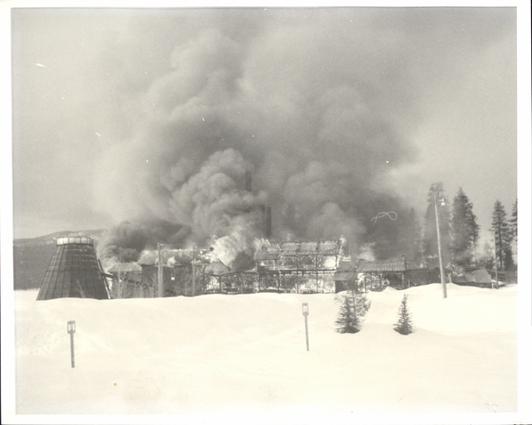 Photograph of the mill up in flames