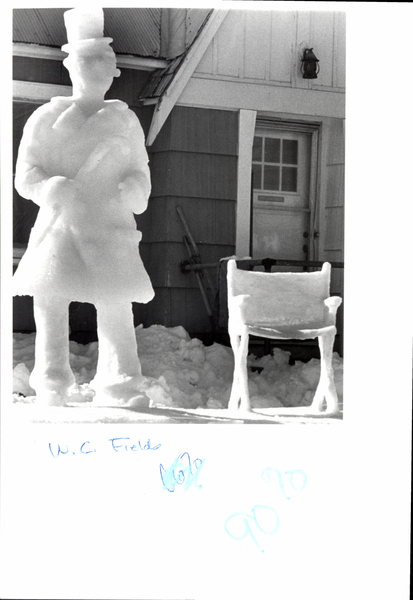 Ice sculpture of a man with a chair. Image contains the text: "W.C. Fields 90%"