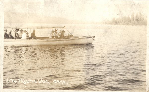 NO. 24 Payette Lake, Idaho, the photo is a boat on the lake with eleven passengers. Image contains the text: "No 24 Payette Lake Idaho"