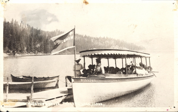 Original postcard , NO. Winston Launch, Payette Lake, Idaho, the photo is of the Winston boat with passengers on the Payette lake. Image contains the text: "Winston Winston Lake Idaho"